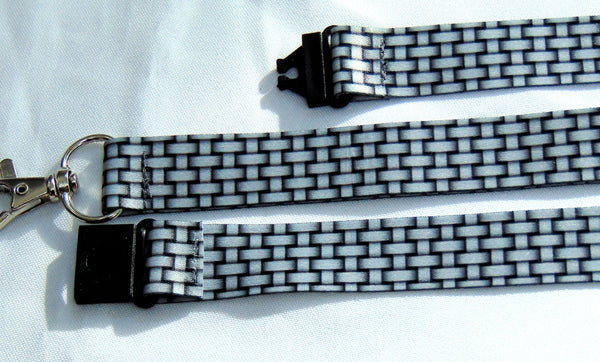 20mm silver grey lanyard with a printed weave effect pattern showing breakaway fittings